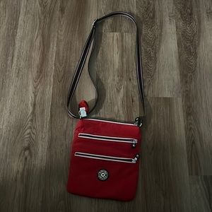 Kipling crossbody in red white and navy blue